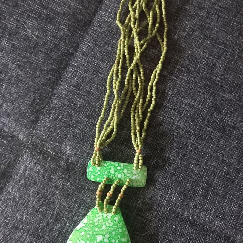 Boho necklace with natural shell and green enamel, like new