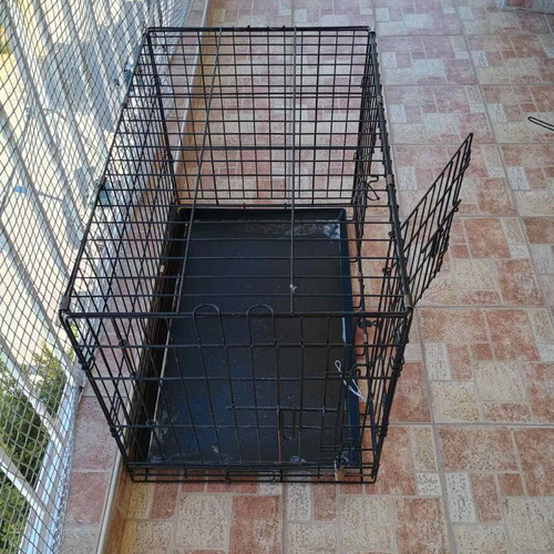 Pet crate used, size M, black with 2 doors