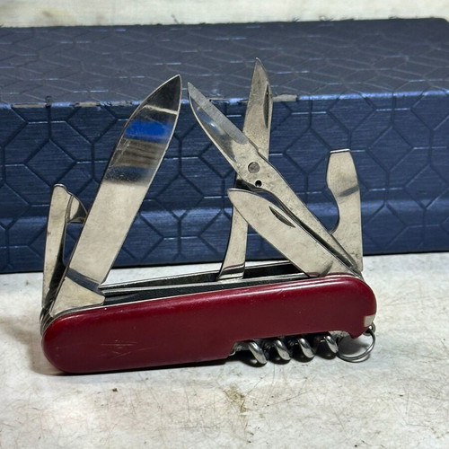 Vintage Swiss Army Pocket Multitool with Scissors and Corkscrew used