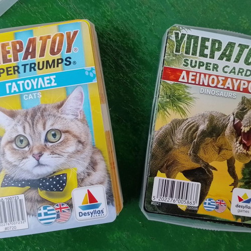 Yperatou card games used, cats and dinosaurs