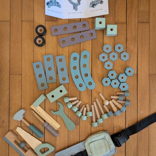 Little Dutch wooden tool bench used with tools and accessories