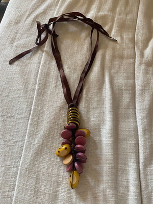 Necklace like new with brown and pink ribbons and beads