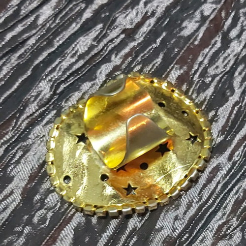 Large ring used, gold color with small strass
