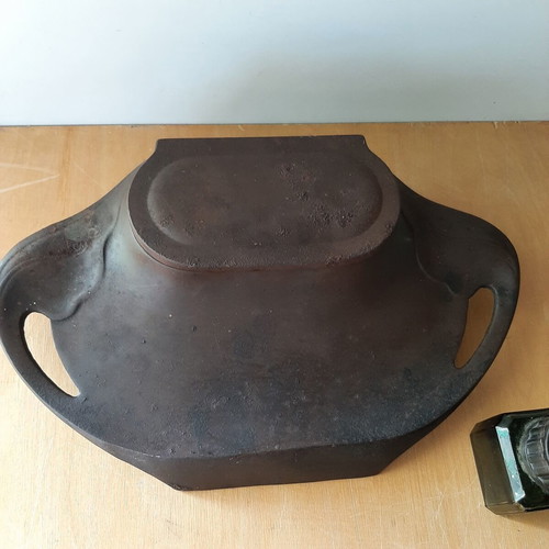 Vintage metal inkwell with ink bottle used