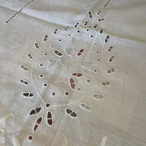 Two handmade linen window curtains with cutwork embroidery and openwork