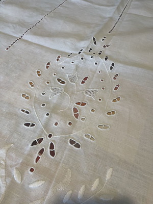 Two handmade linen window curtains with cutwork embroidery and openwork