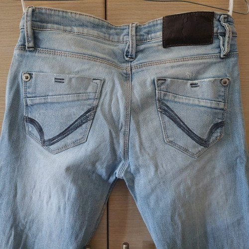 Attrativo light blue jeans with rips used, size 28
