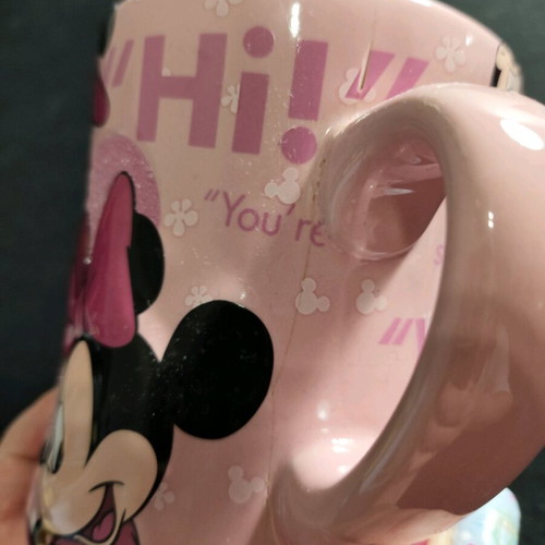 Minnie Mouse Disneyland mug refurbished with small chip