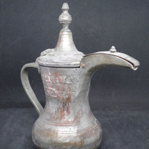 Antique copper coffee kanati used with engraved oriental designs