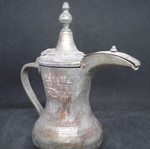 Antique copper coffee kanati used with engraved oriental designs
