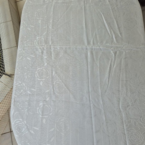 White floral tablecloth with delicate lace edges like new