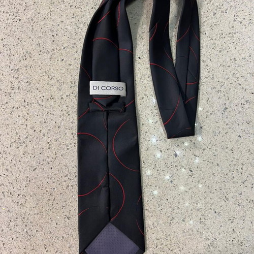 Tie like new in black and blue colors