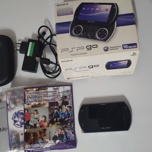Psp Go 16 GB like new with 6 games and case