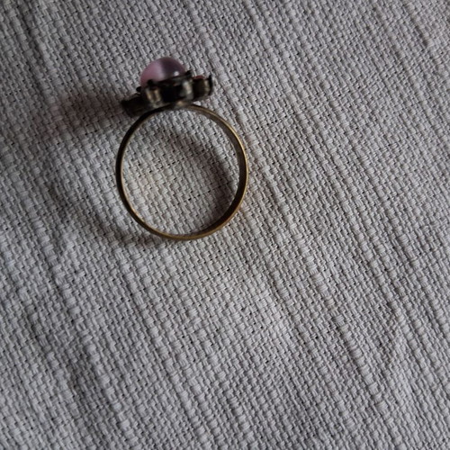 Ring used matte gold color with pink stone and rhinestones