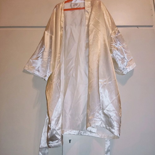 2 women's robes like new, one cream and one black with flower detail