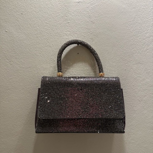 Handbag used with black glitter