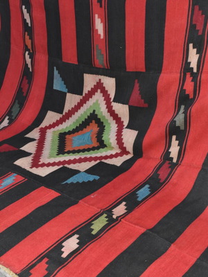 Handmade woven kilim used with traditional design