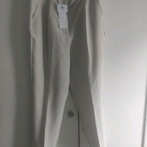 Ecru office pants medium new with box