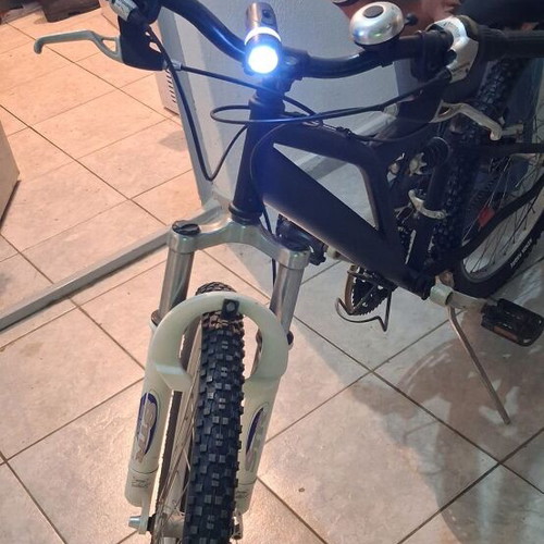 Mountain bike black used with front and rear suspension, V-brakes