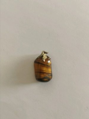 Tiger's Eye pendant like new with silver setting