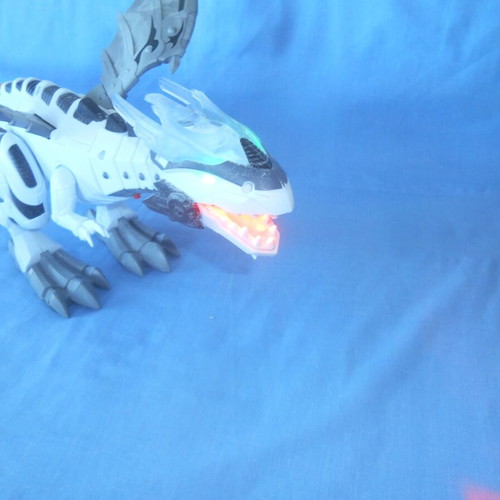 Electronic robotic Dinosaur toy used with sound and light