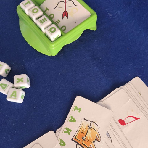 Educational game used for first words and syllables with alphabet cubes