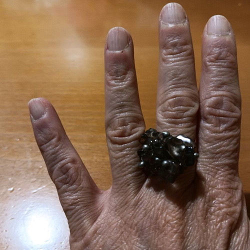 Faux ring with intricate design and adjustable size, new, silver