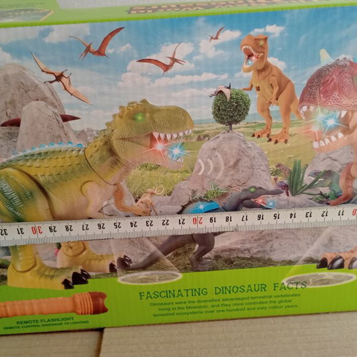 Dinosaur toy like new, in original box with minor wear