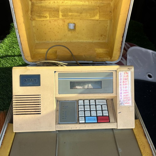 OPAP machine for tickets used, with case