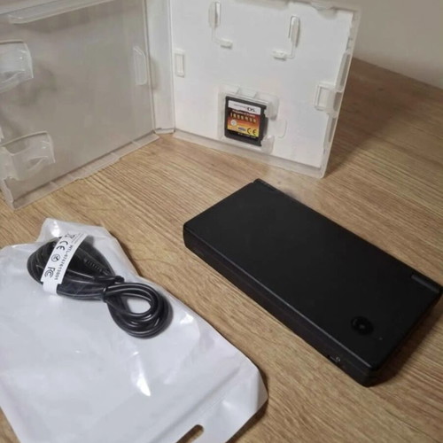 Nintendo DSi Black like new with IronMan DS game and USB charger