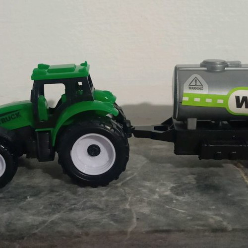Toy tractor used, plastic, like new in box