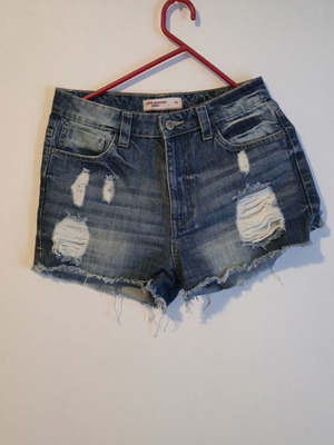 Pink Woman denim shorts size 40 like new with rips