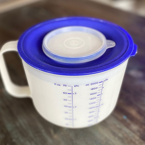 Vintage authentic Tupperware measuring cup unused