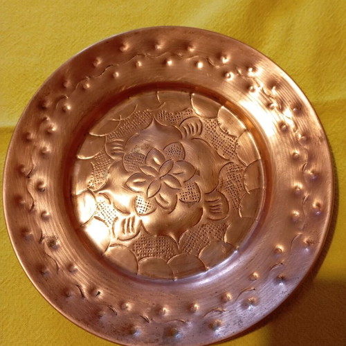 Vintage carved copper wall plate like new with embossed floral design