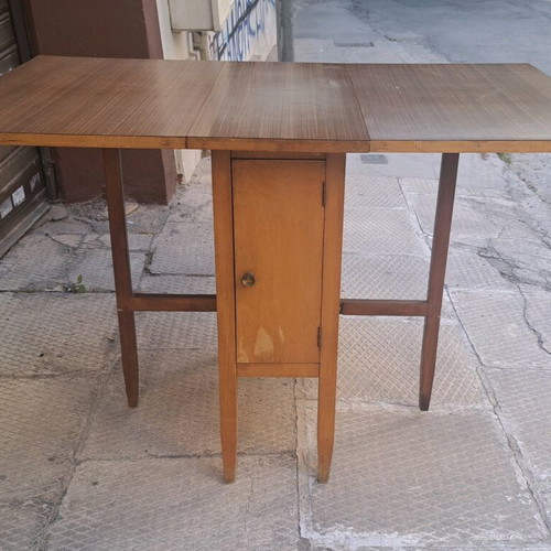 Dining table used with 2 drop-leaves and cabinet with shelf