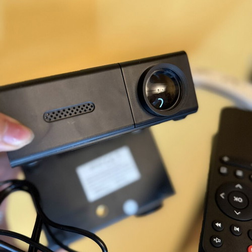 Mini projector like new with remote control
