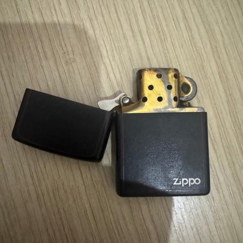 Zippo lighter with red stripe, like new, needs refill and flint