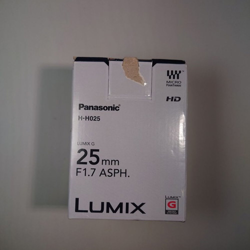 Empty box and manuals for Panasonic Lumix-G 25mm f/1.7 ASPH lens used