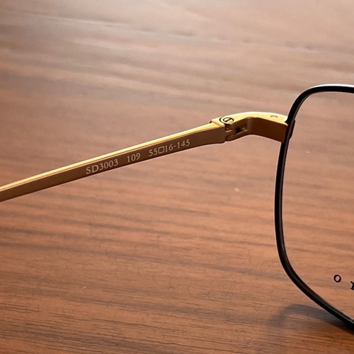 Sandro eyeglass frame new, black metal with gold arms