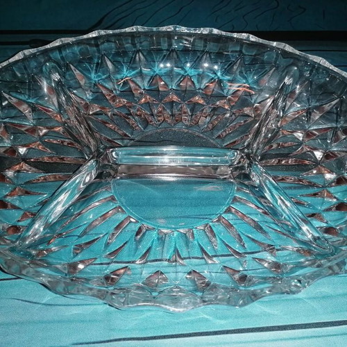 Oval glass platter for nuts used with small chip