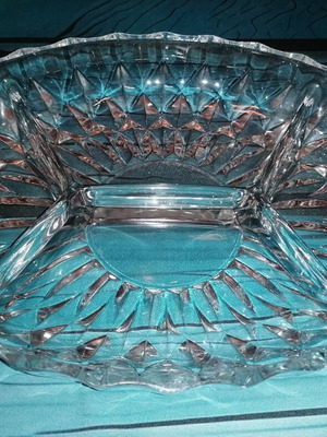 Oval glass platter for nuts used with small chip