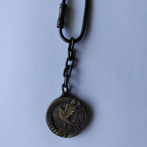 Collectible keychain used for 50 years of Greek Radio 1938-1988