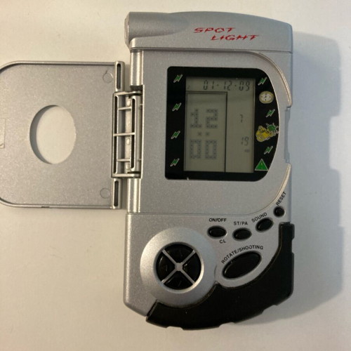 Spot Light electronic game used with built-in flashlight