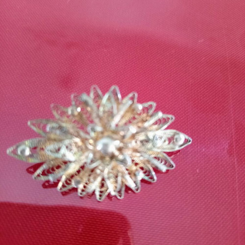 Vintage filigree sun brooch with pearls used