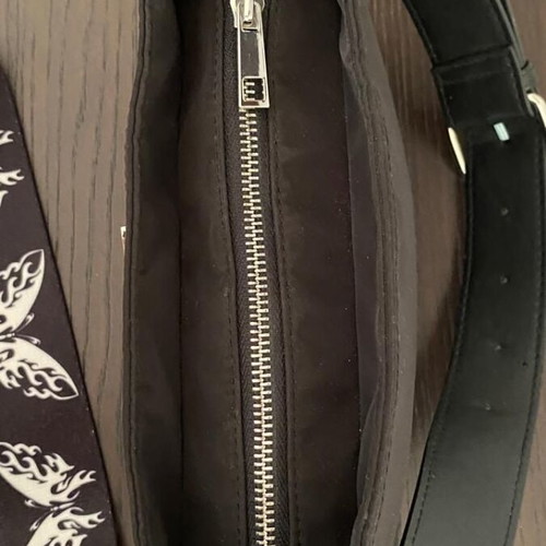 Bershka black shoulder bag used with metal butterfly detail