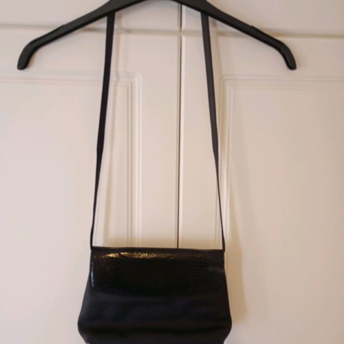 Black shoulder bag used with minor wear