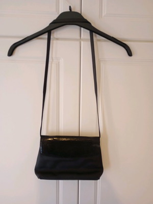 Black shoulder bag used with minor wear