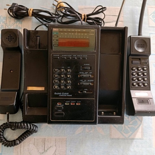 Cordless and landline phone used with radio and clock