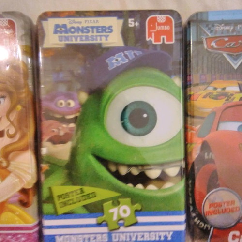 Disney puzzles new, pack of 4 with 70 pieces each