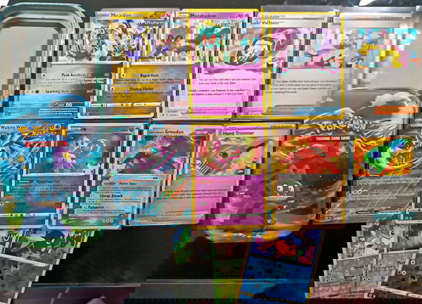 10 Pokemon HOLO + Tin